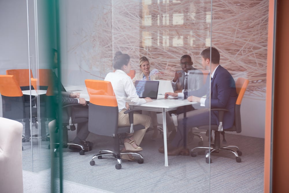 young business people group have meeting and working in modern bright office indoor young business people group have meeting and working in modern bright office indoor